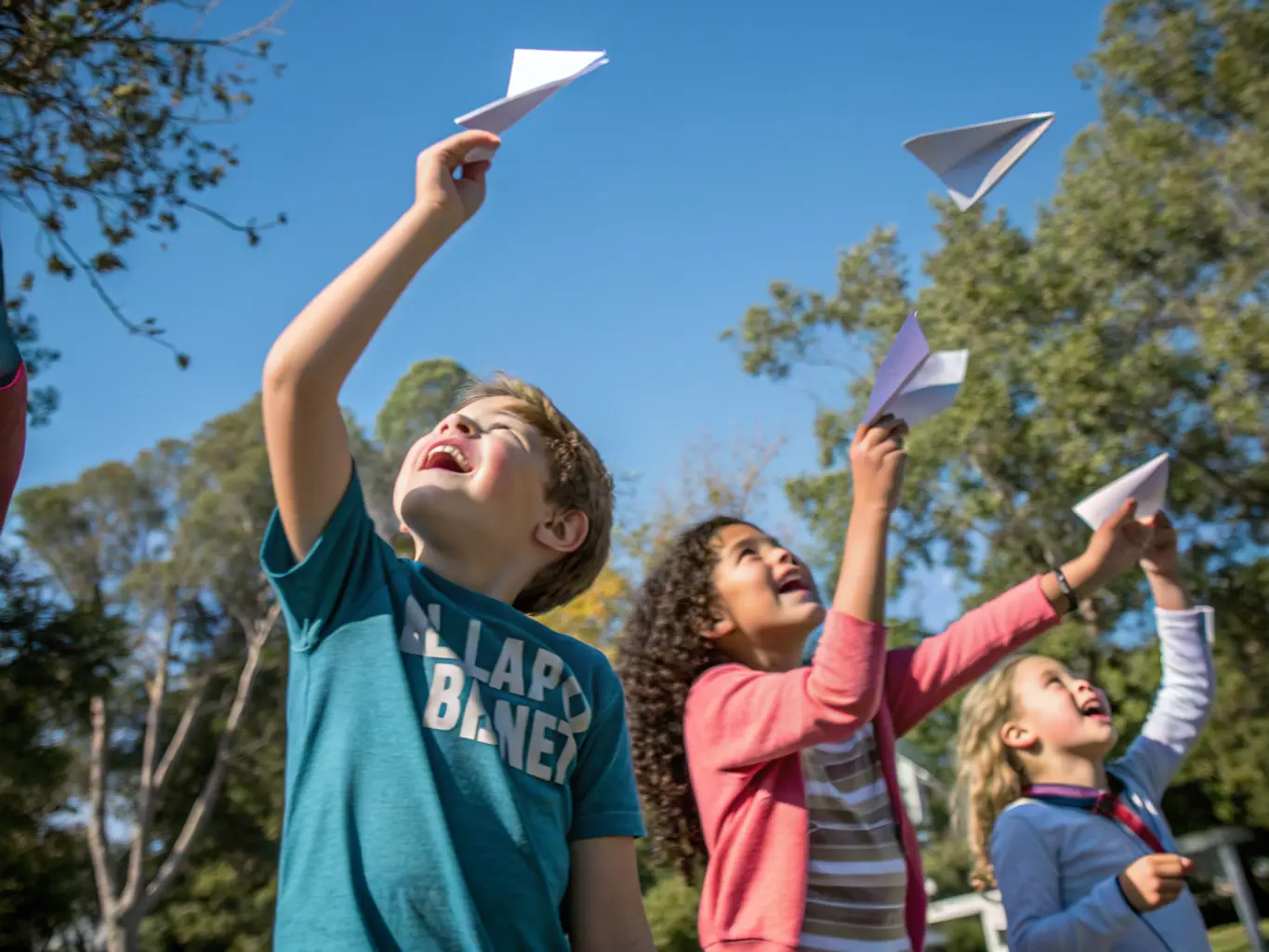 A photograph depicting a group of children participating in an interactive aviation workshop, learning about the principles of flight with hands-on models and demonstrations, set against the backdrop of a vintage military aircraft.